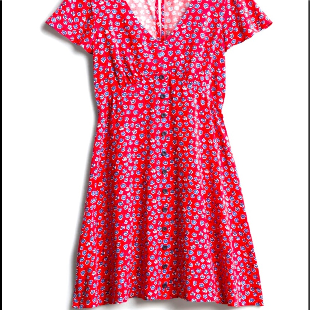 Gently used-worn once, 100% rayon, unlined, flutter sleeve, v-neck